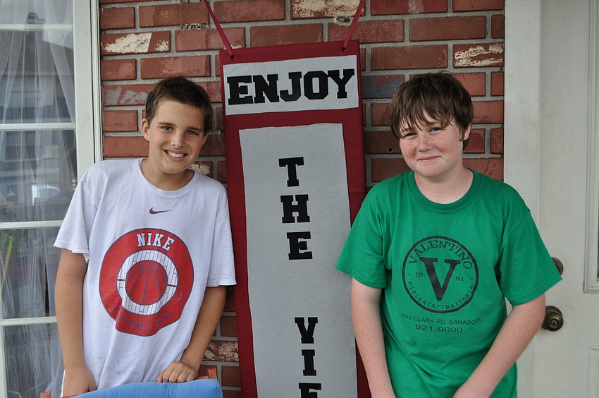 The View baskbetball players Landon Koven and Sean Walsh helped out at the silent auction.
