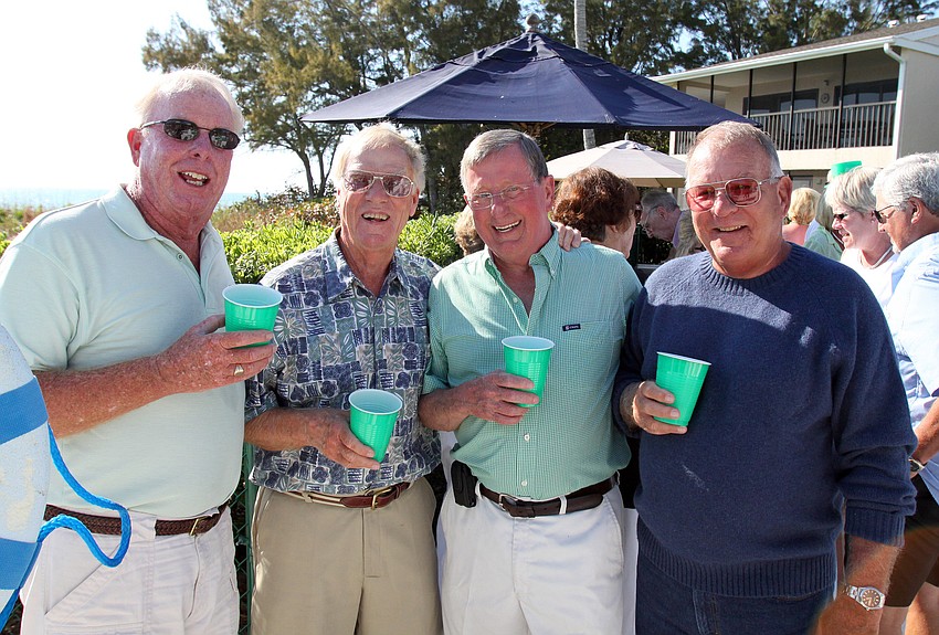 Bud Baldwin, Bud Giaschi, Congrad Niester and Dick Stover have a good time on Thursday, March 17 during Cedars West's St. Patrick's Day party.