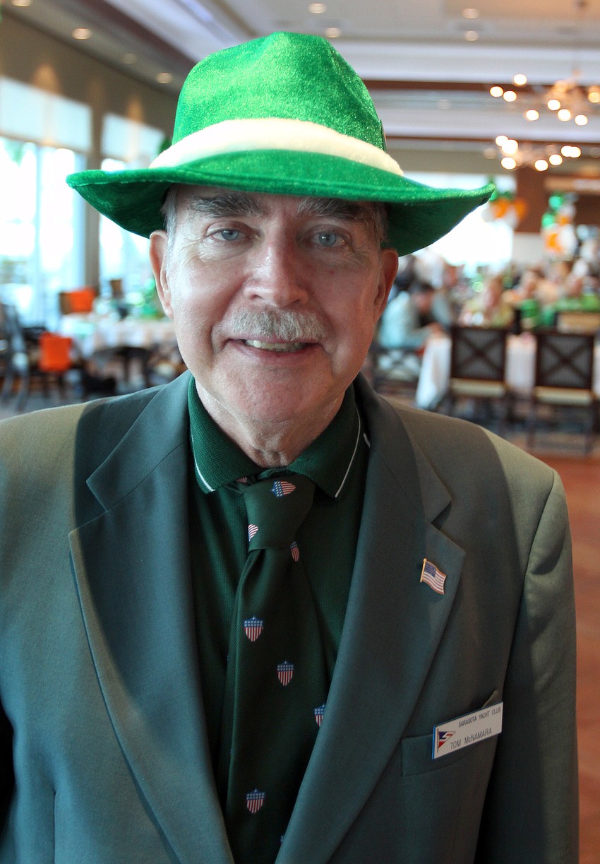 Tom McNamara wears a big green hat on Thursday, March 17 at the Sarasota Yacht Club's St. Patrick's Day dinner.