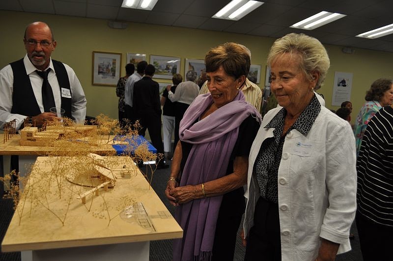 Sandy Dearwester and Shirley Jacobs check out a piece in the 'Ageless Creativity' exhibit.