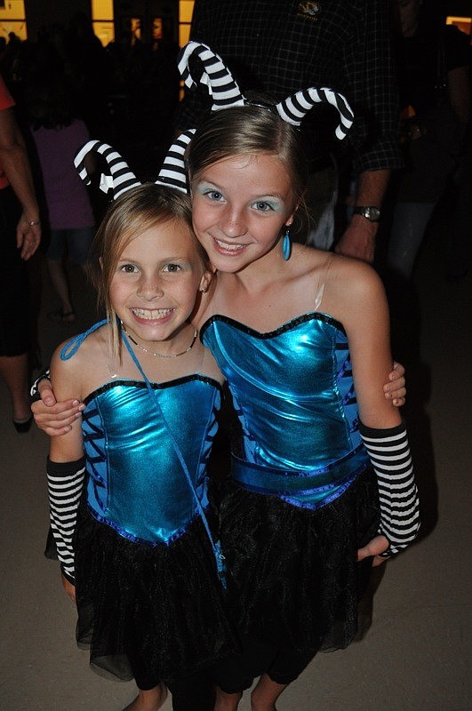 Kaitlyn Craig and Skyler Homan dressed like characters from a computer game.