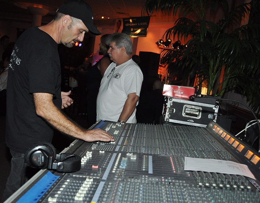 Douglas Wilson checks the sound.