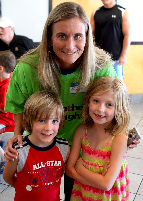 Principal Allison Foster with Kai, 5, and Kennedy, 7, at McTeacher's Night.