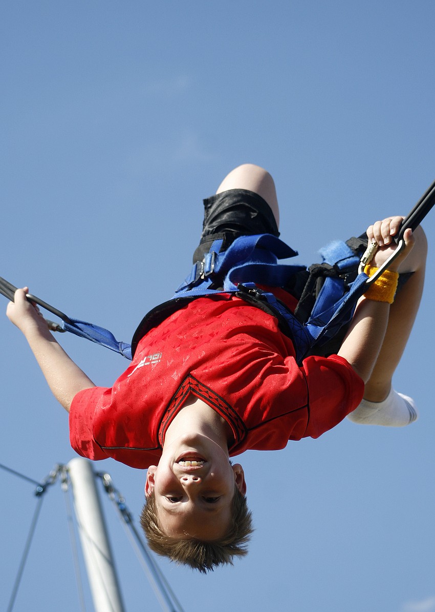 Troy Burgess, 10, had no fear of heights at the bungee jump.