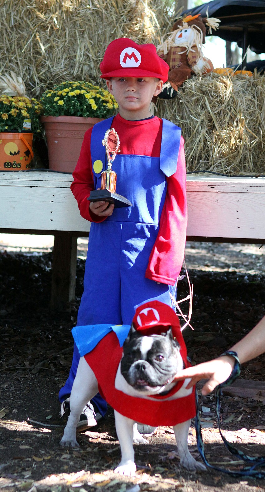 Landon and Diesel won a trophy for their Mario costumes.