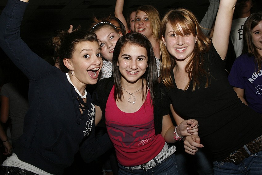 Ally Rahn, Kaila Snowden and Caitlin Otis hit the dance floor early.