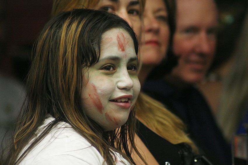 Yaislin Valencia listened carefully to the drug-free presentation before the dance.