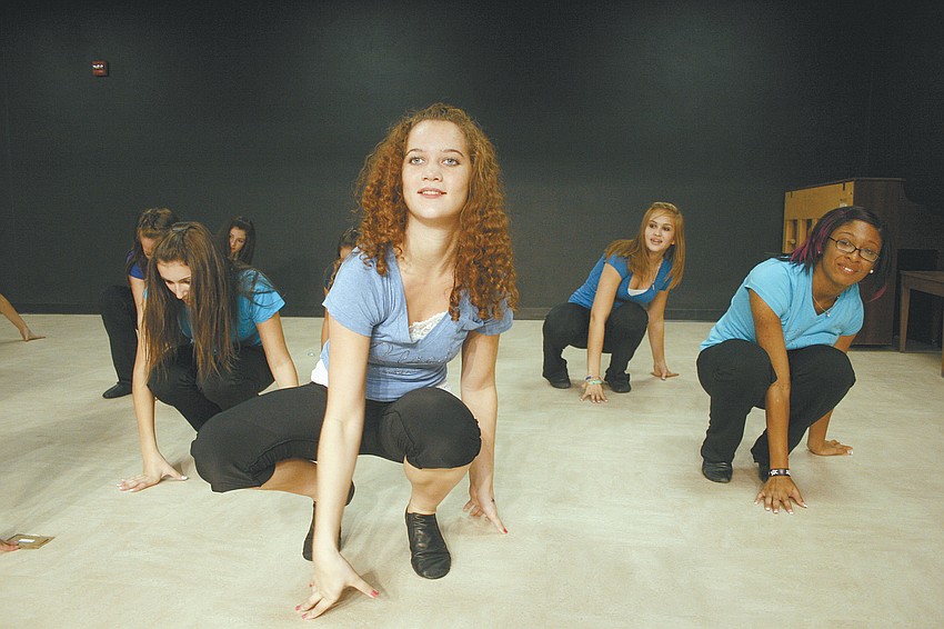 Savannah Coughlin, center, performed with the Black Pearls dance team.
