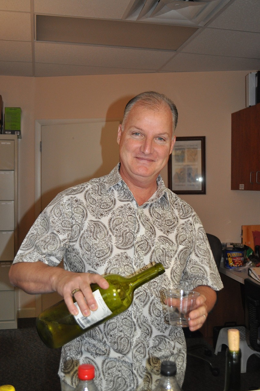 Ray Griffith volunteered his bartending skills for the event.