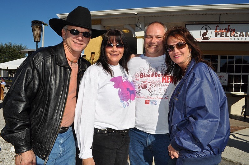 Pictured is Bryan Halliday with Lesli and Brian Davis and Kristen Richelieu.