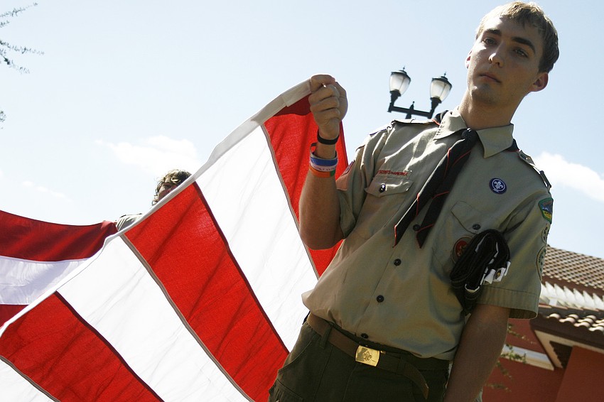 Michael Swift was one of several Boy Scouts to carry in the memorial flag.