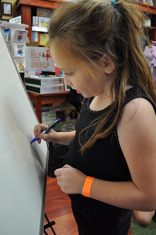 Seven-year-old Kristen Barbarito drew a whomping willow during a game of Harry Potter Pictionary.