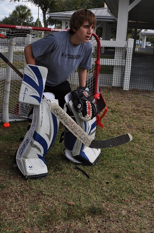 Drew Fineberg, 15, played goalie for a hockey game.