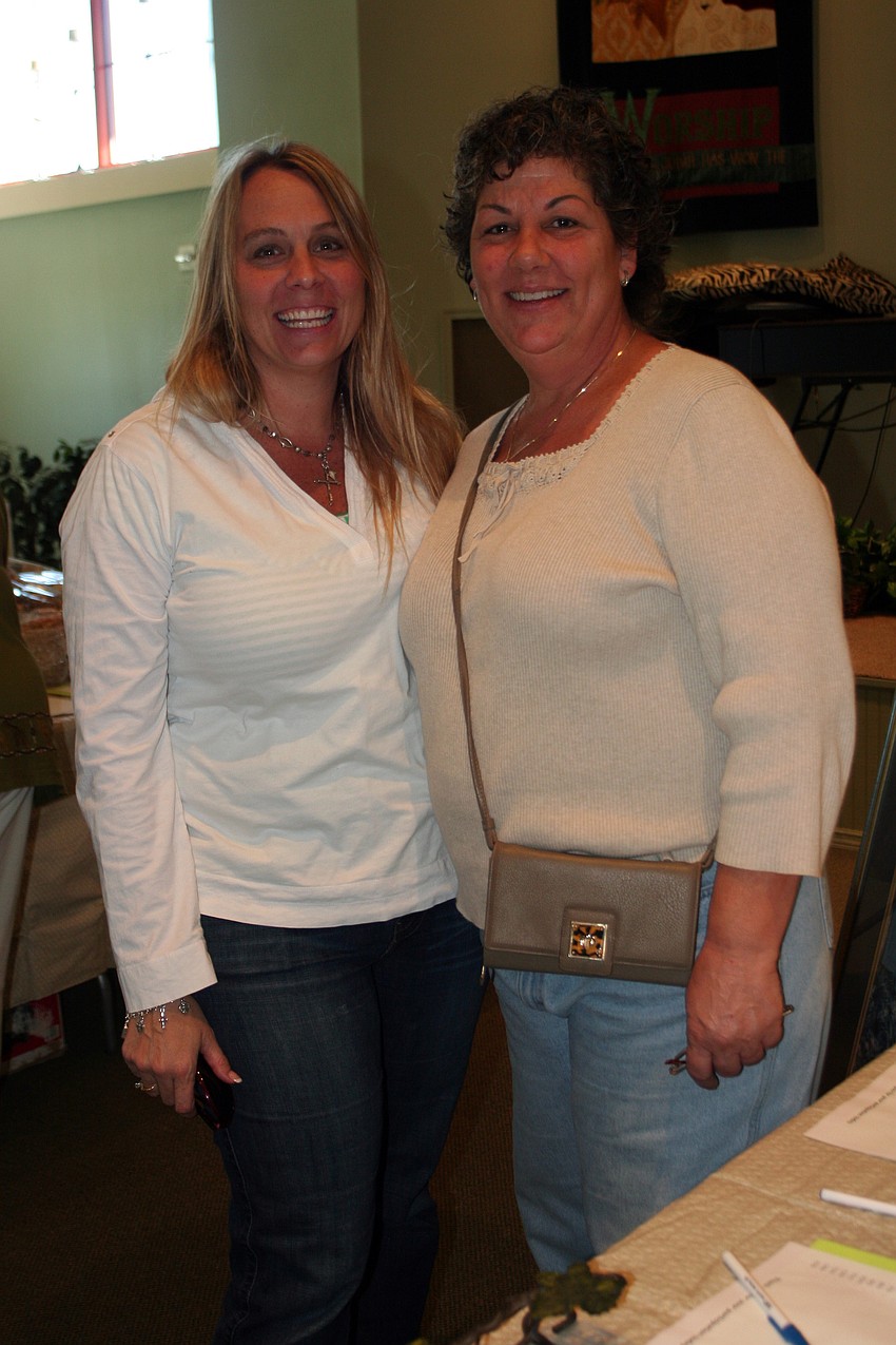 Kirstin Shontere and Lynn Haun enjoyed doing some Christmas shopping at the silent auction.