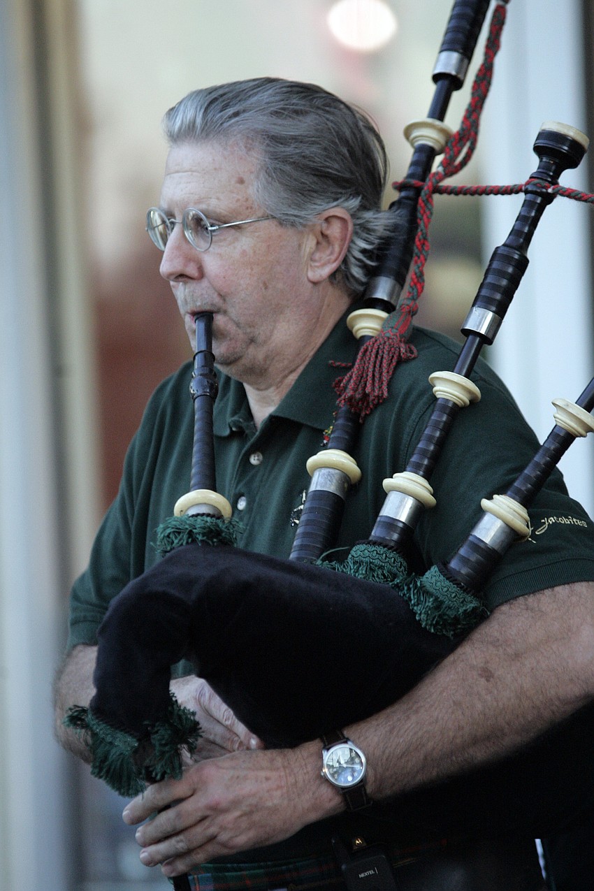 Richard Murray entertained the audience on the bagpipes.