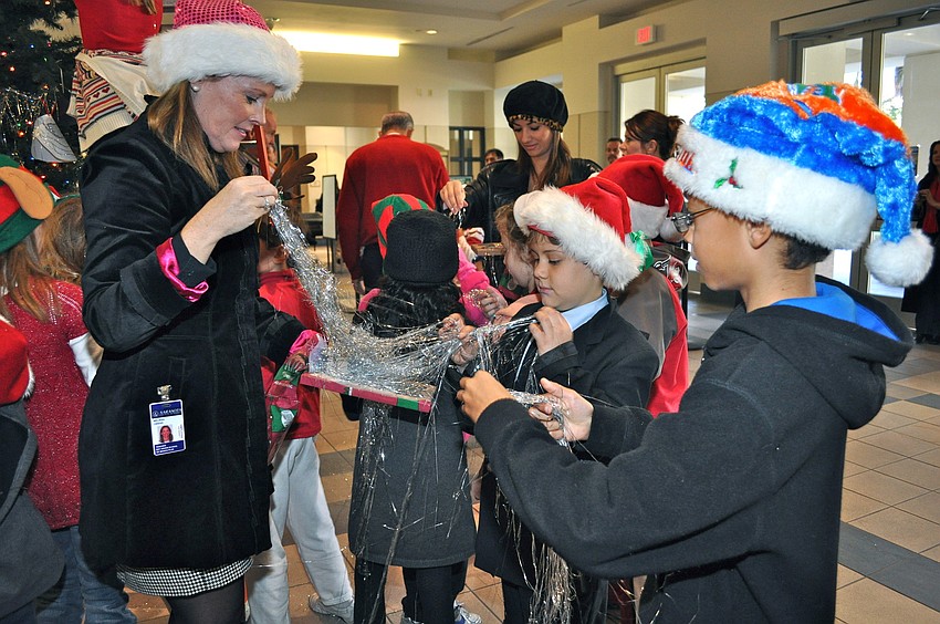 Third grade teacher Missy Owens with Oliver Koch and Miles Gellbert