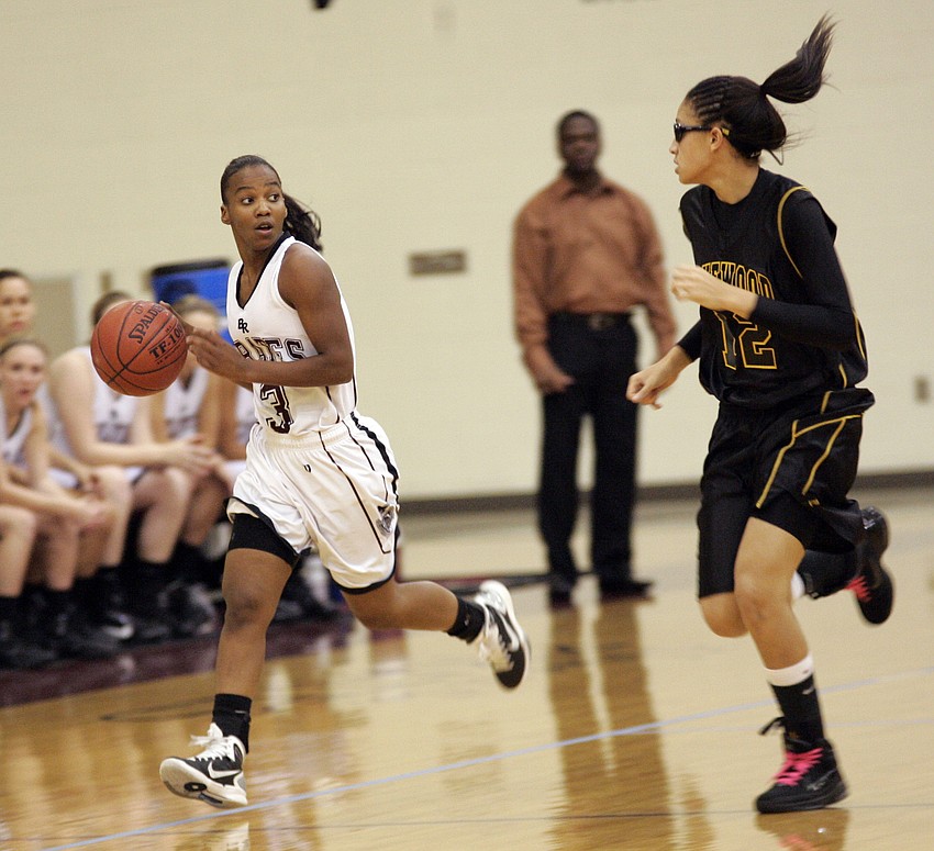 Braden River High senior point guard Olivia Moore pushes the ball up the court.