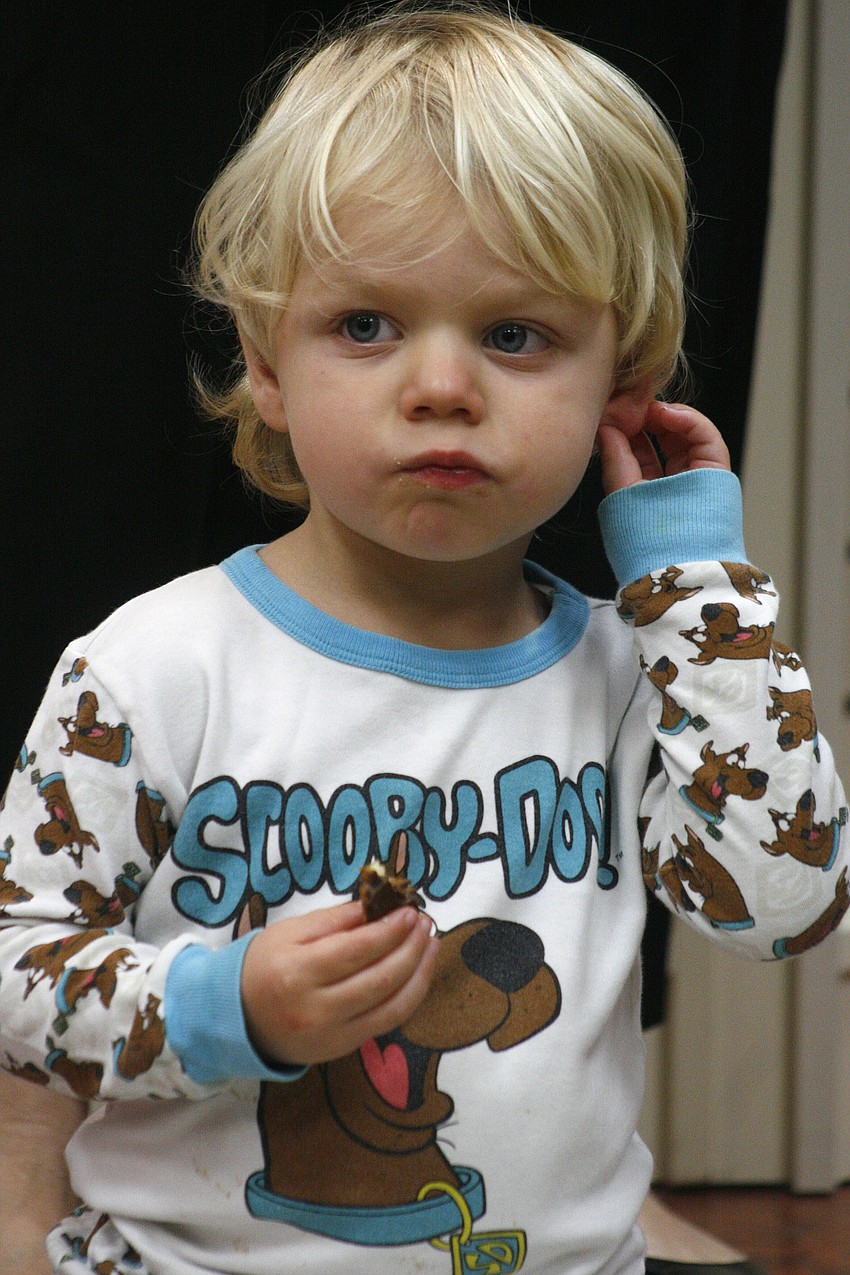 Remy DeVictor, 2, wore his Scooby Doo PJs to the party.