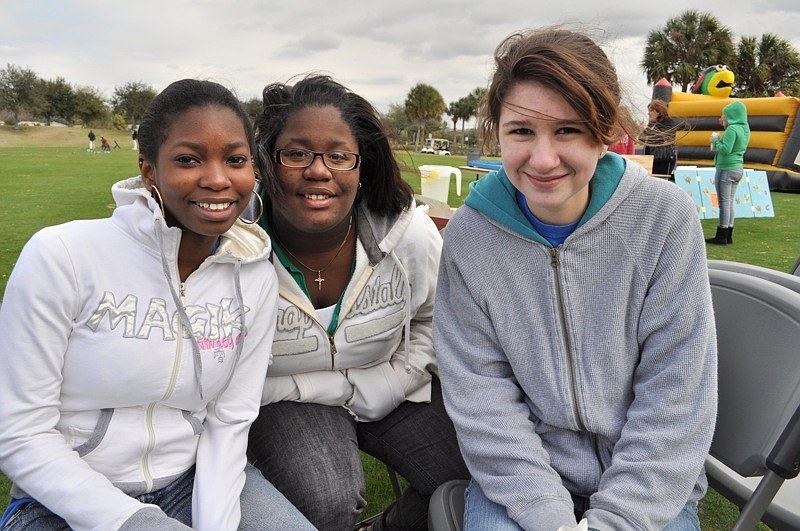 Braden River High School Key Club members Wendy Laza, Danielle Sewell and Amy Weger were responsible for fake tattoos.