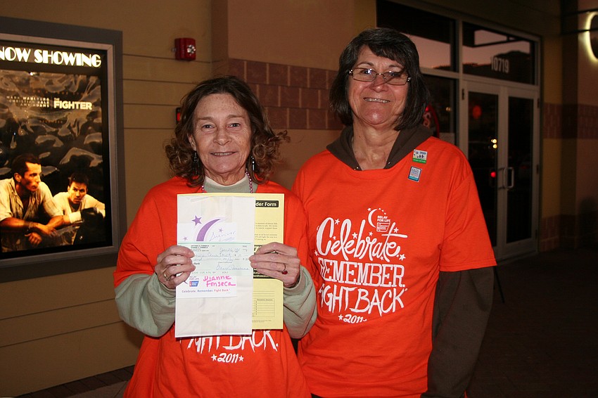 Chris Cole and Carole Zoellner spent the evening collecting donations for the Luminaria Ceremony.