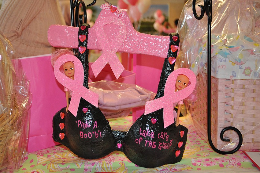 Silent auction items were displayed throughout the club.