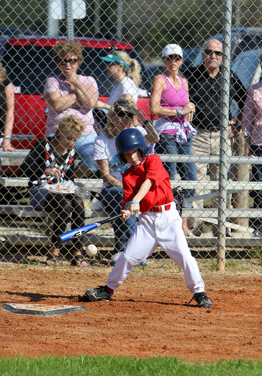 Evan Crisp, 6, hits the ball during his game on Saturday, Feb. 19 at Twin Lakes Park during Central Sarasota Little League Opening Day.