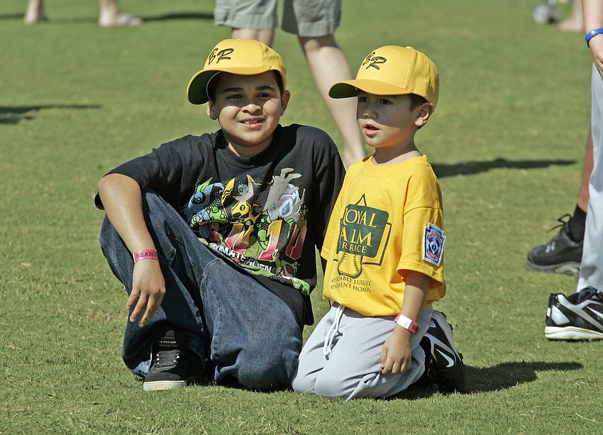 Foster brothers Edwin Acosta, 10, and Mason Brughelli, 4, had fun at Braden River Little League's Family Fun Day.