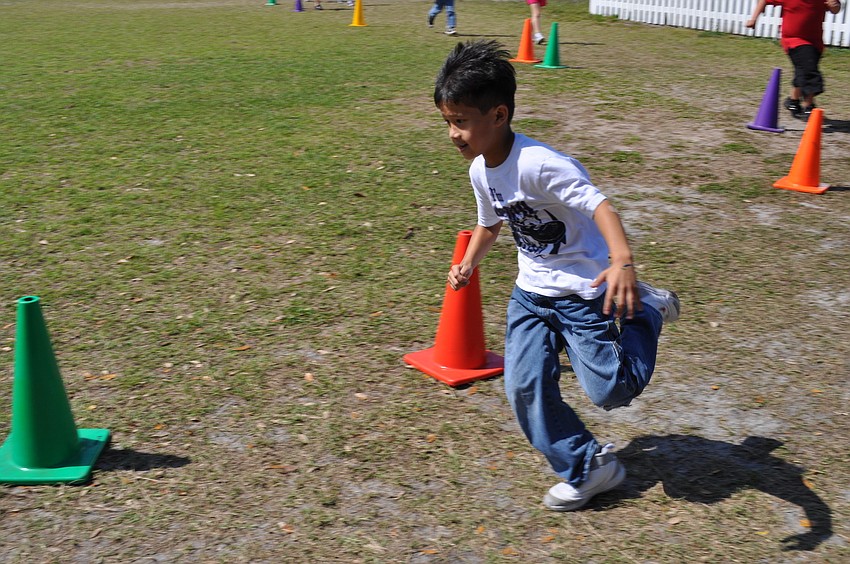 Keyden Nguyen, 7, sprinted around the course.