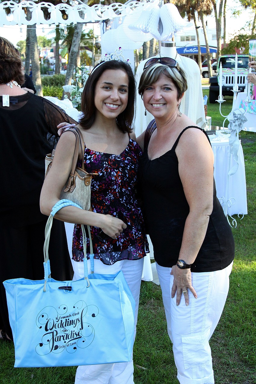 Amber Thomas and Kim Leitzen enjoy getting ideas for Thomas' wedding on Saturday, Feb. 26 at St. Armands Circle's Weddings in Paradise Circle of Love event.