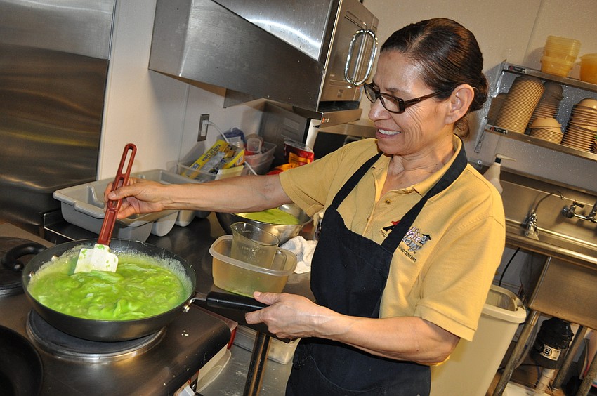 Kiddie Academy chef Gloria Garcia cooked up green eggs and ham for lunch.