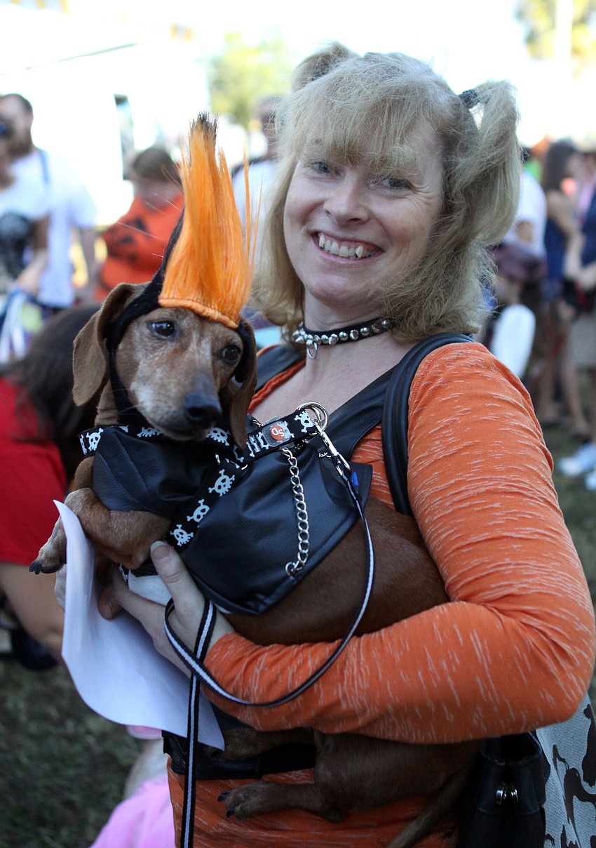 Toni Carroll with her punker dachshund, Buddy, 10.