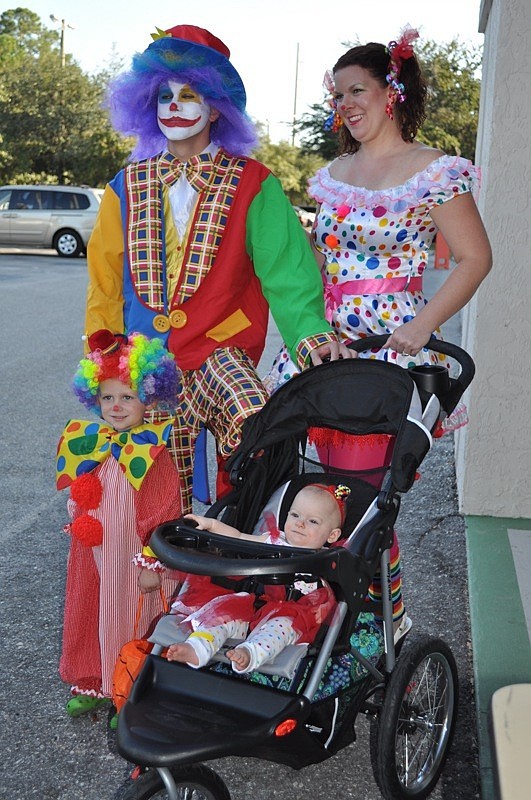 Brian and Mindie Camus dressed up with their children, Landyn and Laylah.