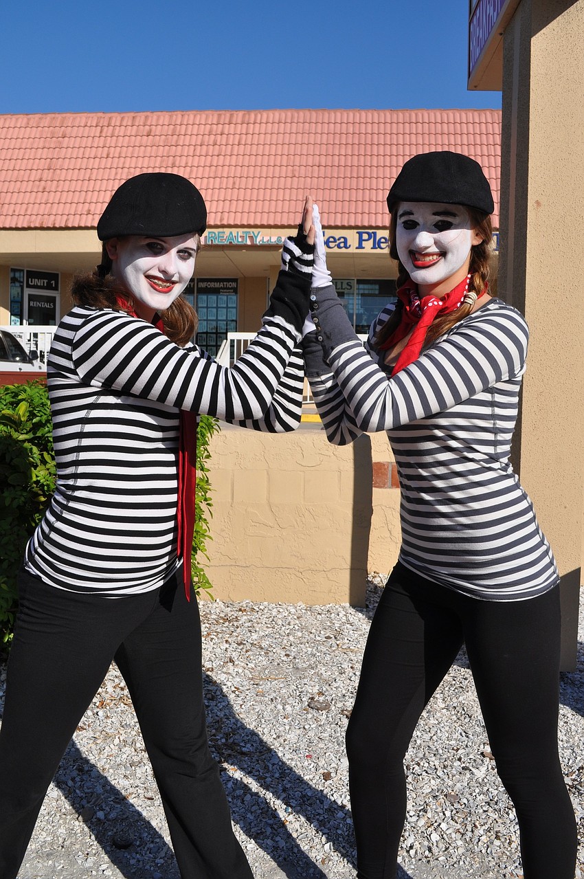 Haillie Horr and Bridget Walsh express themselves through pantomiming.