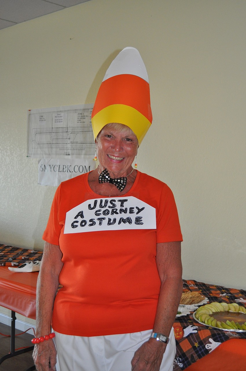 Lynn Delmosis as candy corn.