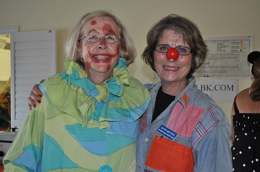 Cindy Kuchnel and Ruth Meyers clown around.