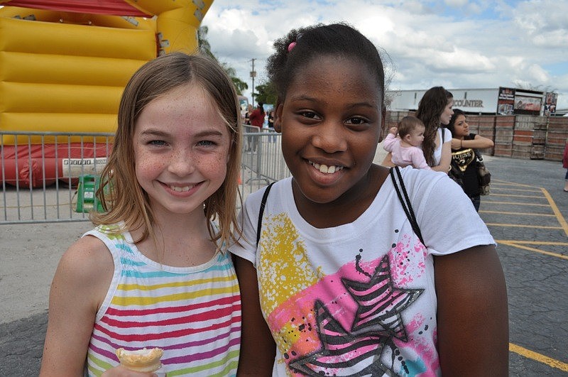 Ashley Gerbig, 8, and Amari Moore, 11, came out to watch their sisters perform.