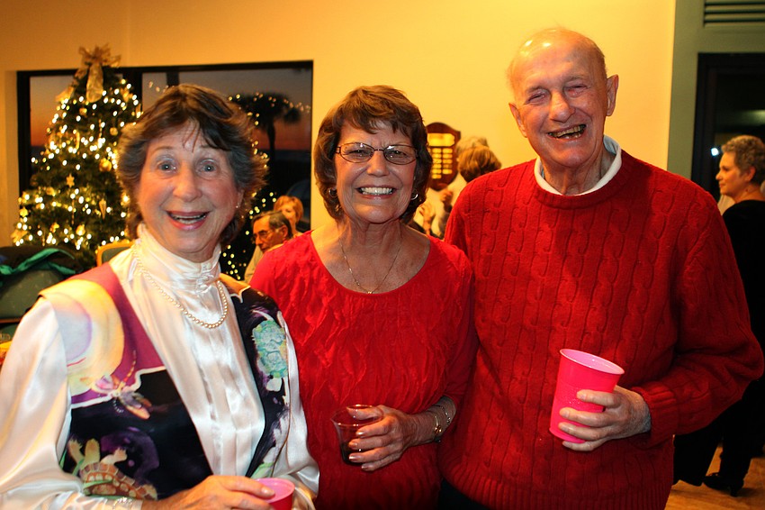 Barcy and Mil Grauer pose with their friend, in the middle, Kathy Naso.