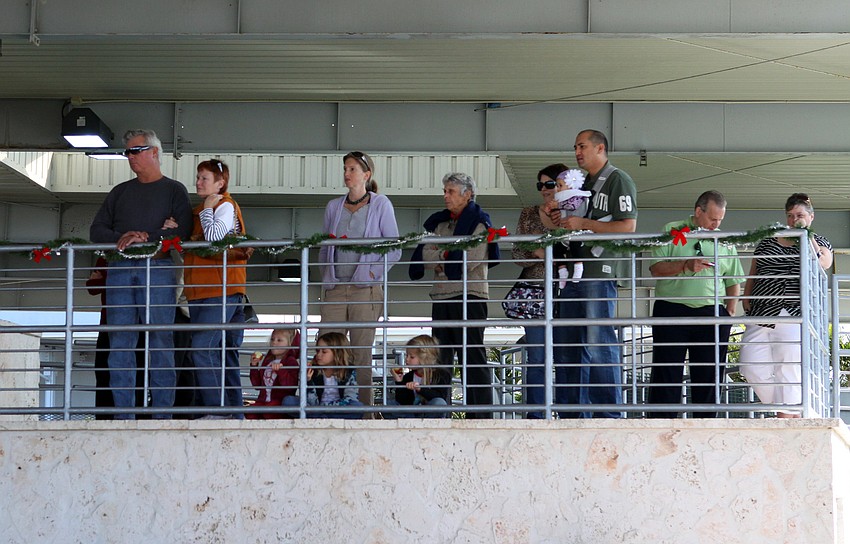 Some attendants of the performance watched the orchestra from up above.