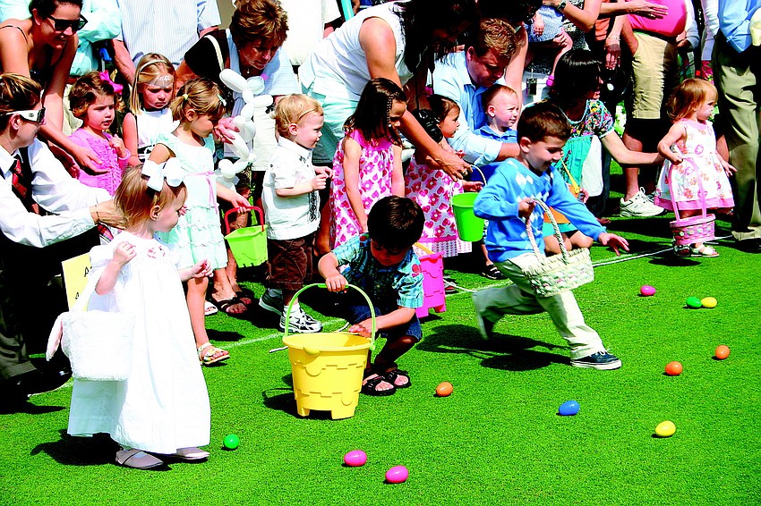Children raced to fill their baskets with eggs in April at The Oaks Club's Easter celebration.