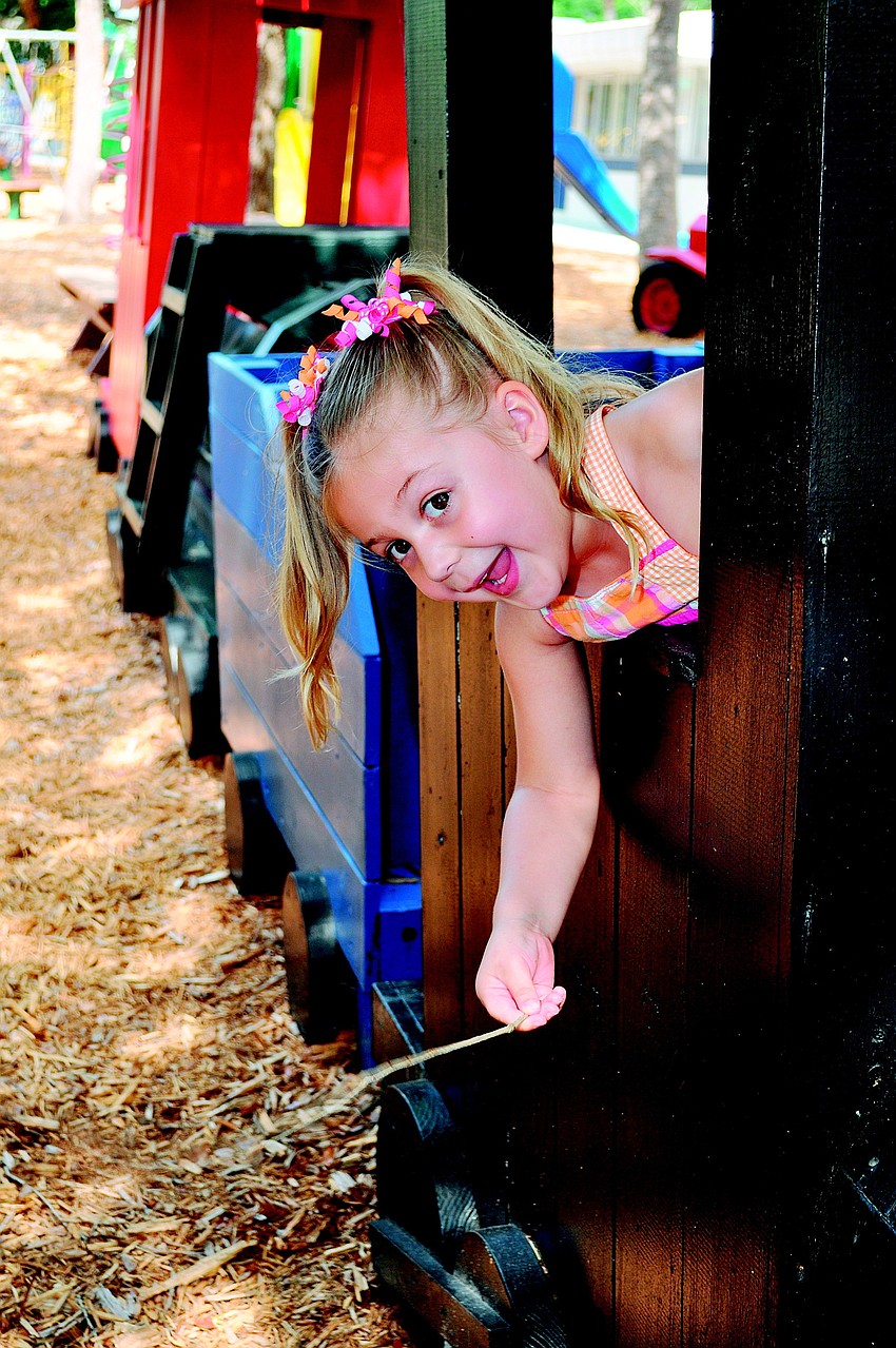 Kendall Cassidy plays peek-a-boo in August at Out-of-Door Academy's Kindergarten Play Date.