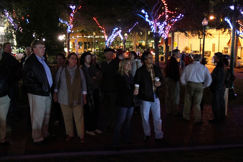 The crowd takes in all the changing colored lights in the trees of Five Points Selby Park on Friday night.