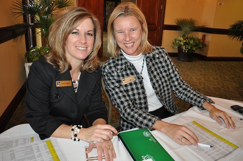 Cherri Kessler of RBC and Stacey Romano of M&I checked guests in.