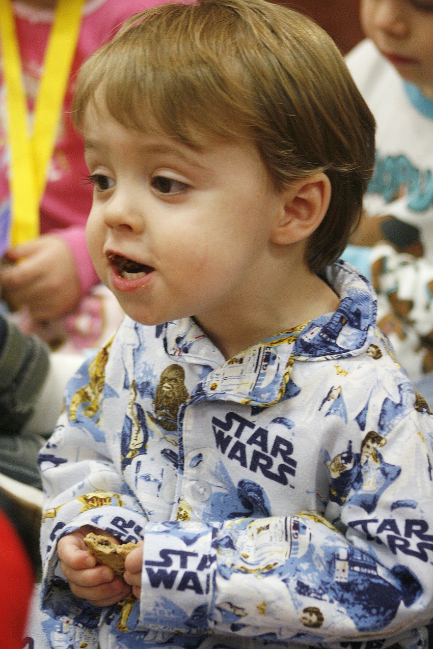 Sebastian Parr, 21 months, loved Tracey Williams' book.