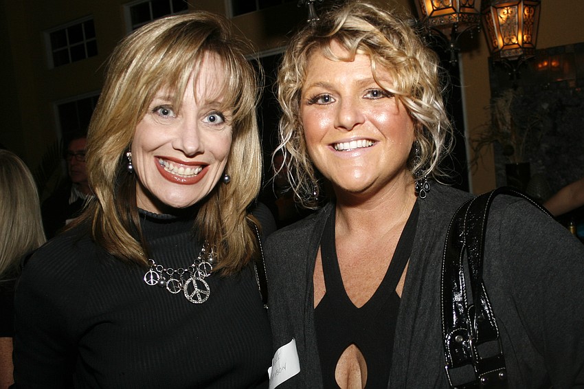 Cheryl Gibson and Michelle Sampson, who runs the Sarasota-based Gimme Shelter Pets.