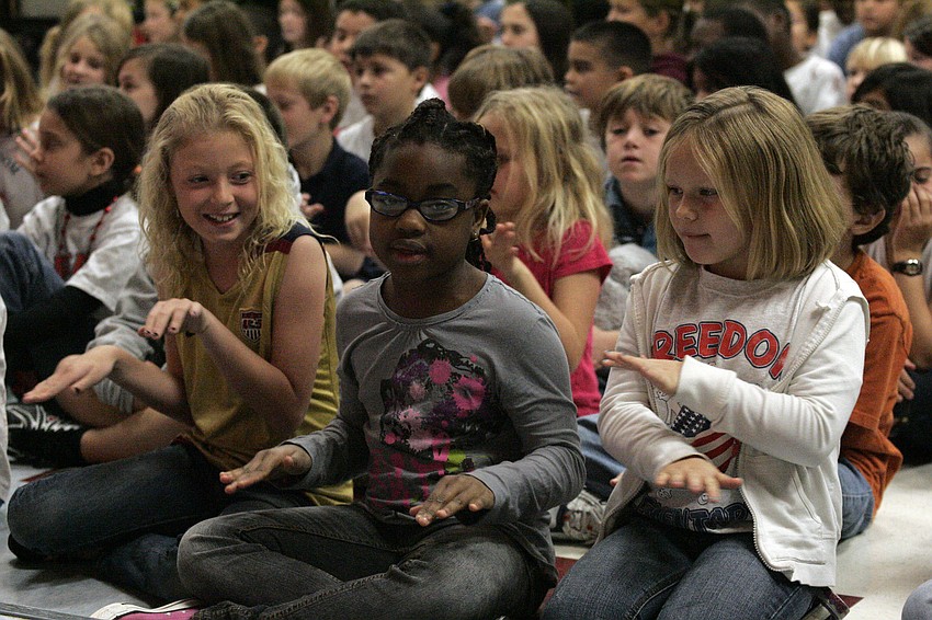 Dylan Gordan, Aba Sankah and Emma McIntyre knew the words and motions to all of the songs.