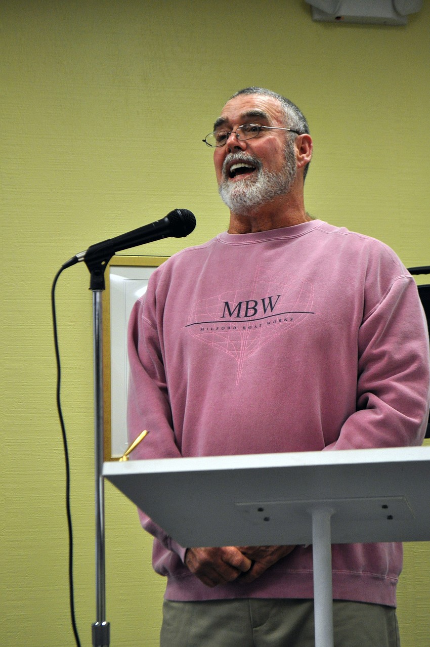 Longboat Key Historical Society president Tom Mayers calls the meeting to order.