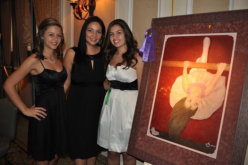 Kailey Fischer, 15, with her mom Vina, was proud of her sister Karissa, whose piece was featured in the show.