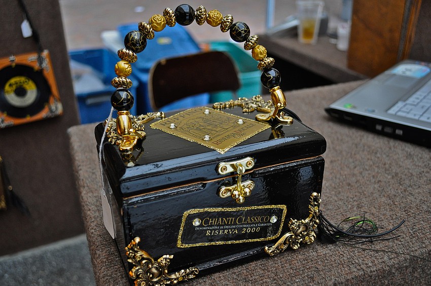 Elaine Laurent creates purses using wine labels.