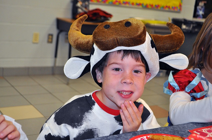 Daniel Taylor was all smiles in his cow costume.