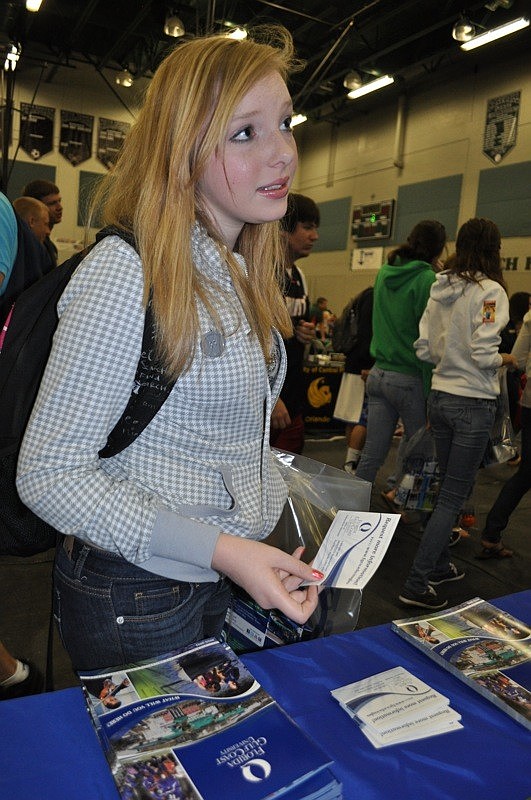 Teisha Pack, a senior, stopped by a booth for Florida Gulf Coast University.